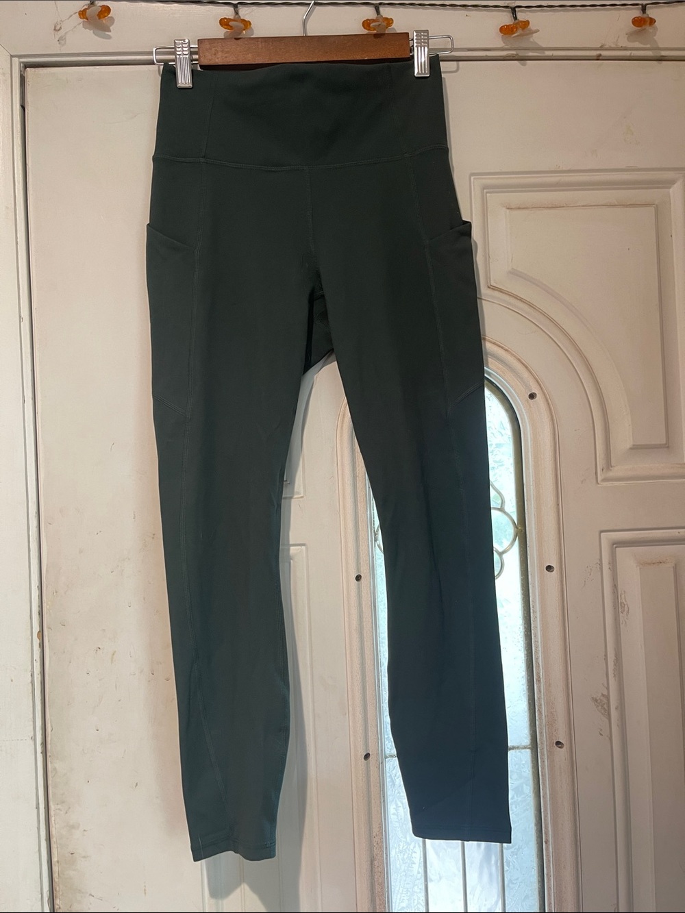 Fabletics High-Waist Pocket Leggings in Dark Green
